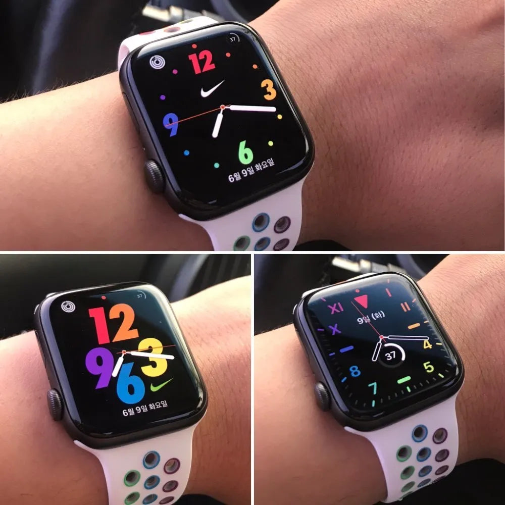 Black silicone sports wristband with a silver single-buckle closure on a wrist.