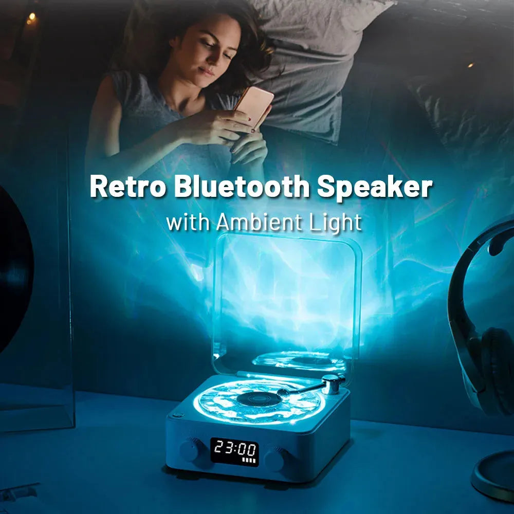 Retro turntable Bluetooth speaker with rotating transparent disc and RGB lighting effects
