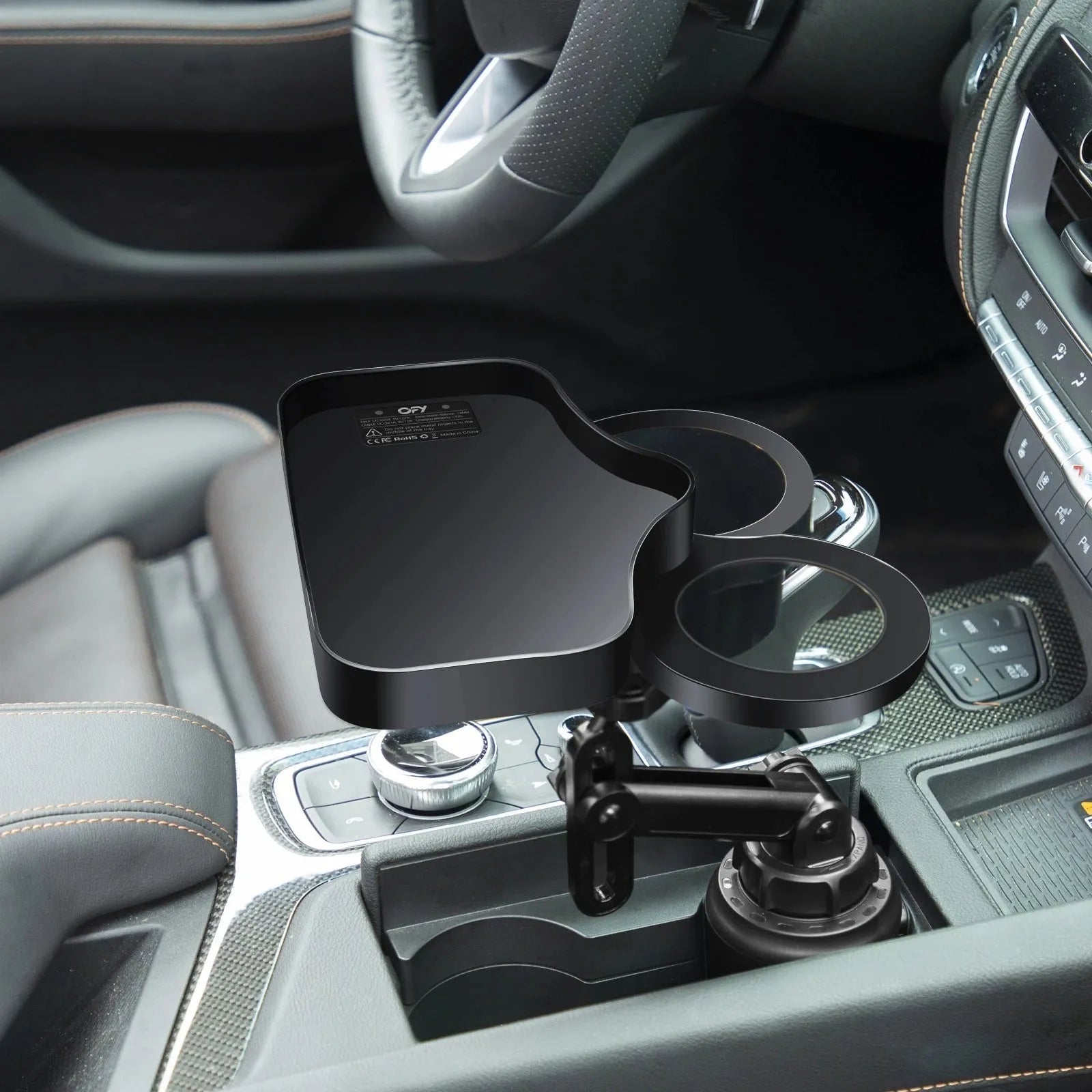 Car cup holder with wireless charging board, ABS and polyurethane construction, fits dashboard area