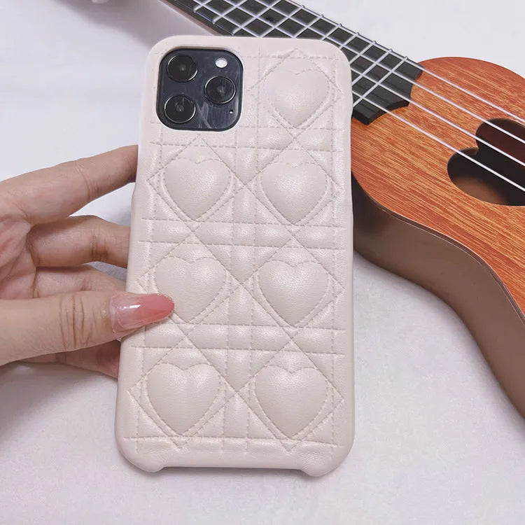 Leather silicone iPhone case with heart and plaid pattern in milk blue, pink or black
