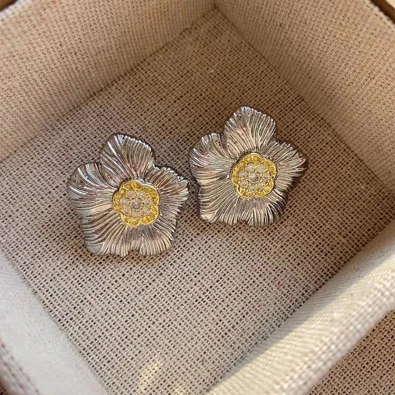 Retro textured gardenia stud earrings with two-tone electroplated finish on copper