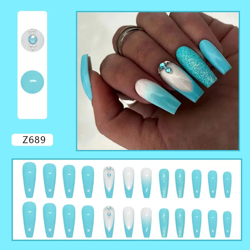 Long ballet shaped artificial nail patches with smart blue diamond pattern on solid blue background