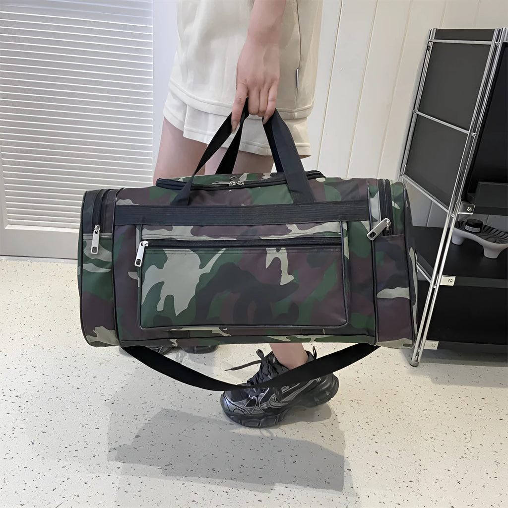 Camouflage coloured waterproof luggage bag with striped polyester lining.
