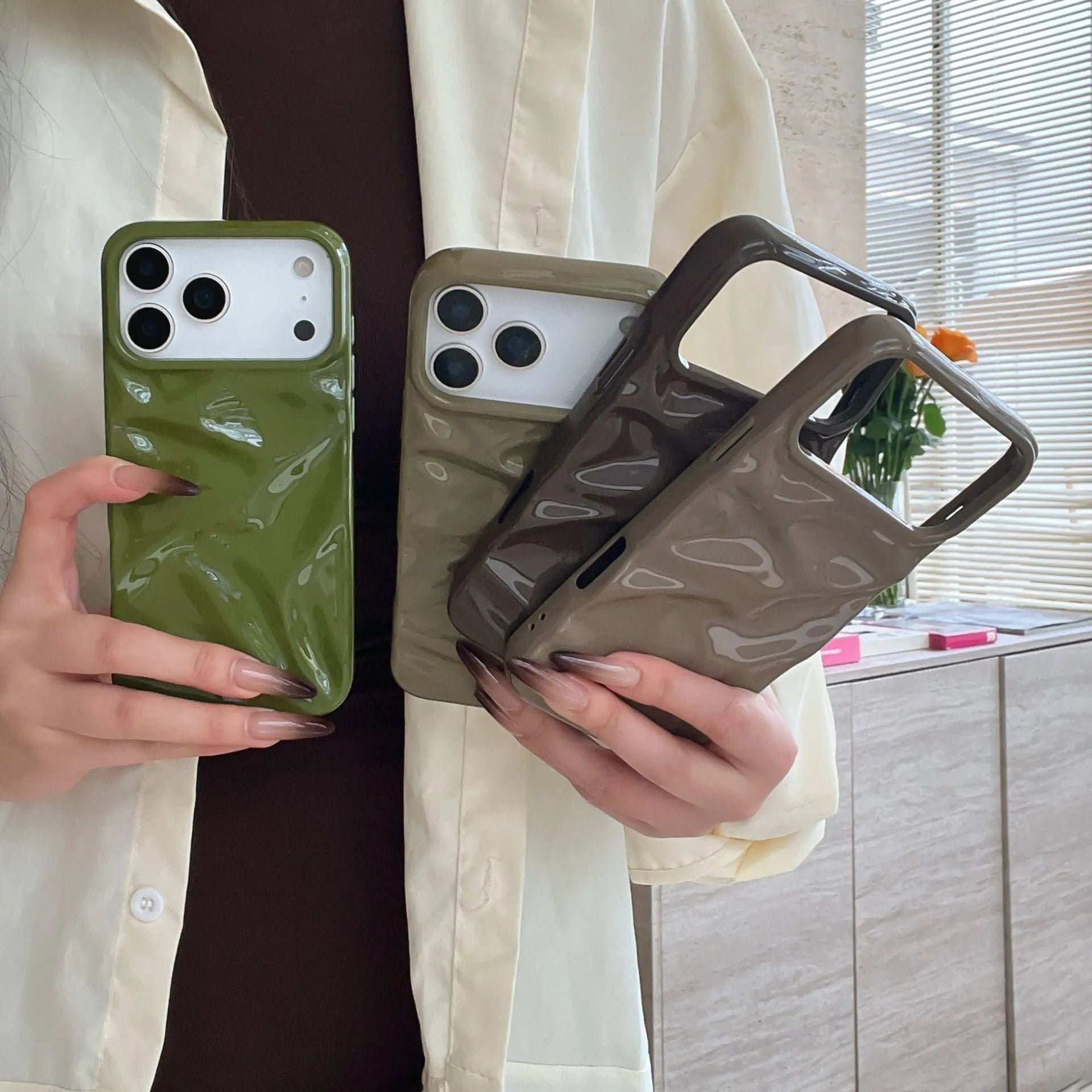 QF pleated TPU phone case in green for iPhone 15 Pro with three-dimensional textured pattern