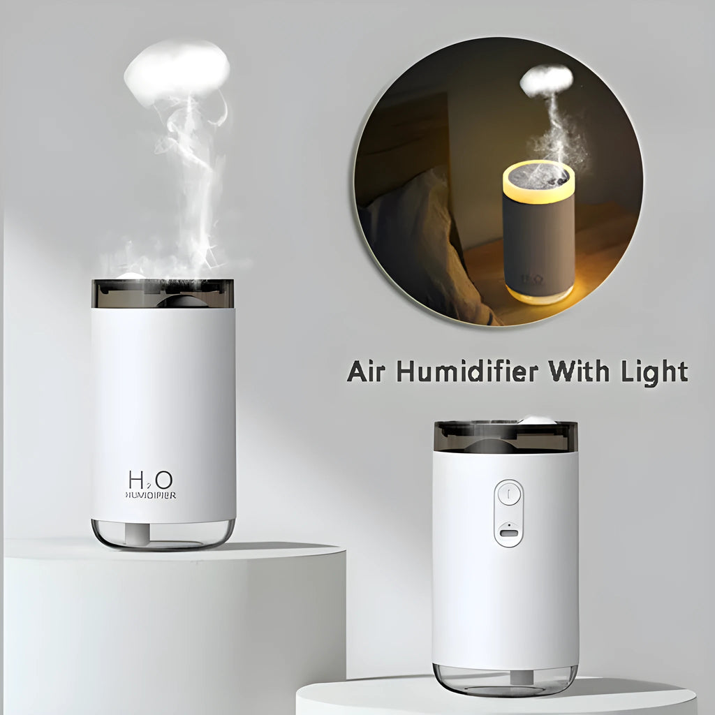 Blue jellyfish USB humidifier with night light on wooden table, showing mist output