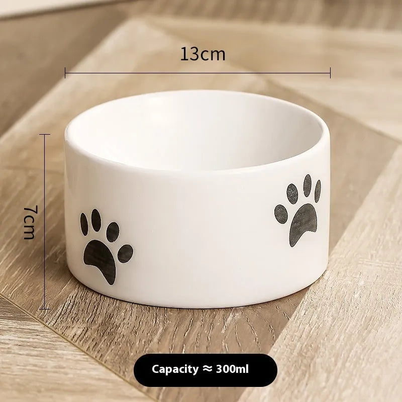 Ceramic cat bowl with high-footed design showing cat's paw decoration pattern in selected colour