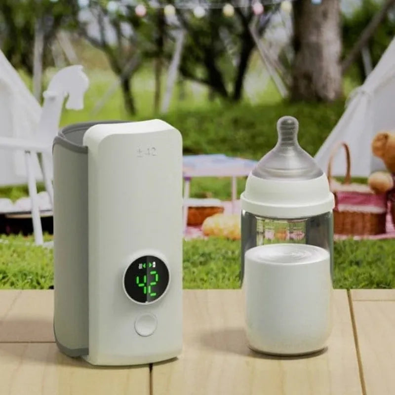 Grey portable baby bottle warmer with USB charging cable and wrap-around heating design
