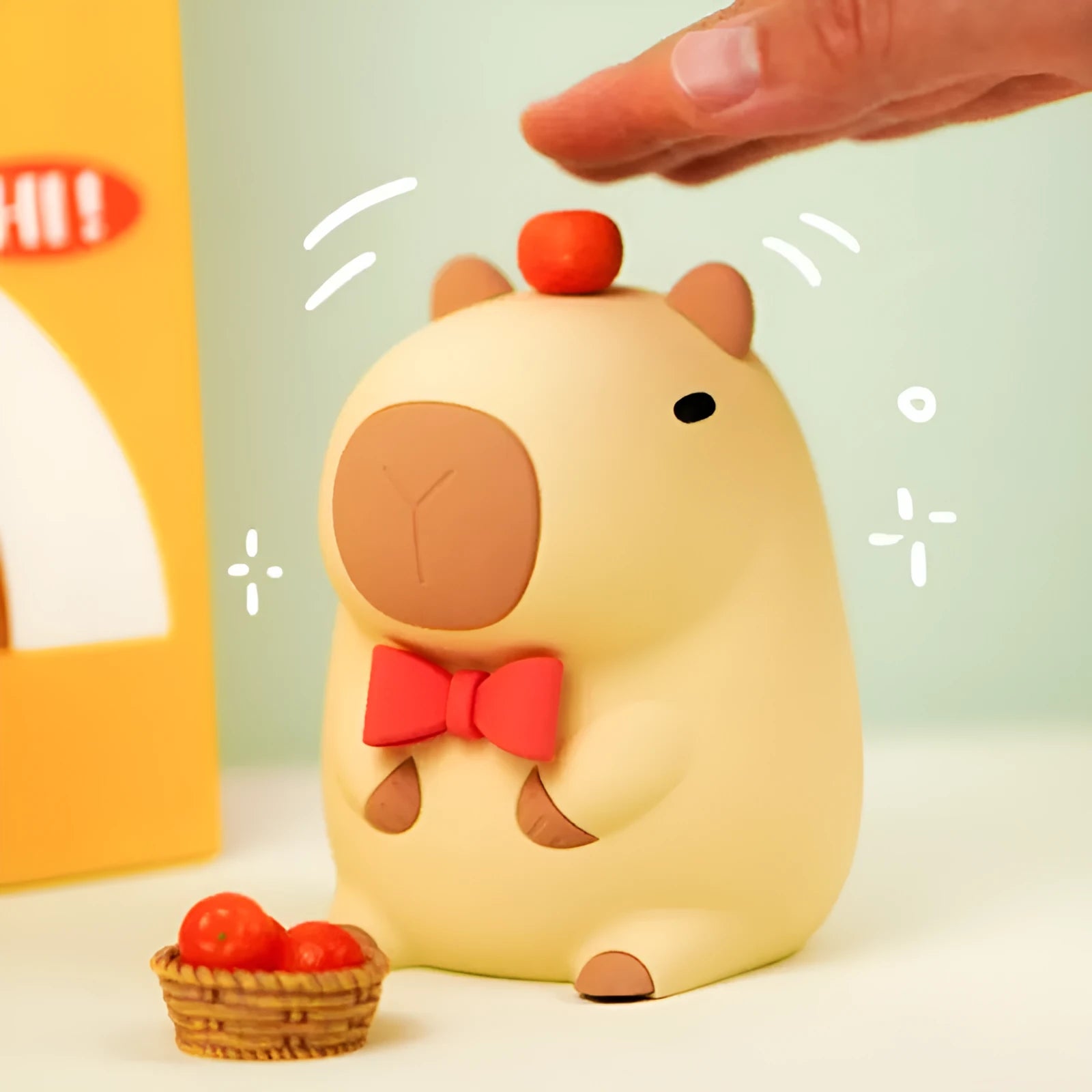 Capybara-shaped silicone night lamp with USB charging port and compact dimensions