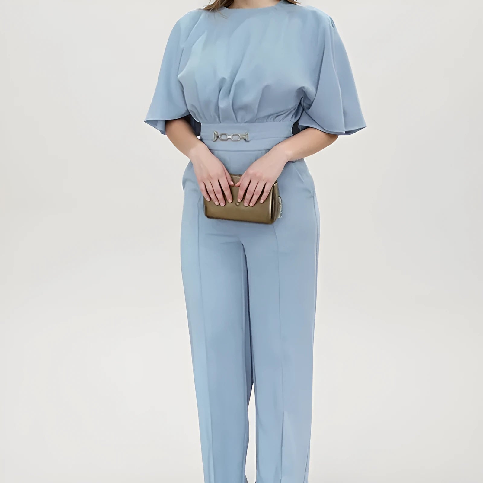 Blue men's two-piece polyester suit set on a hanger, featuring a long-sleeve shirt and trousers.