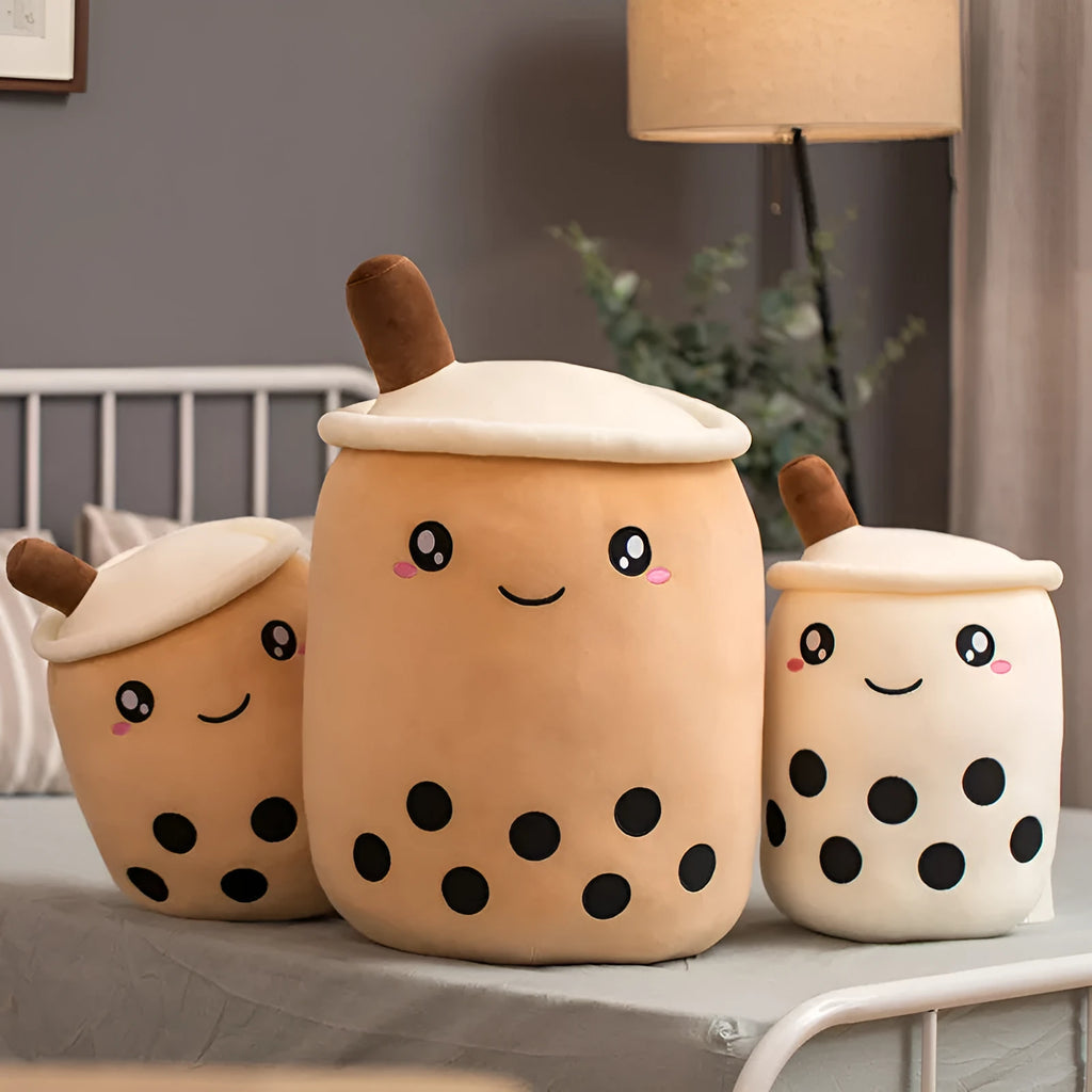 Brown boba milk tea plush toy with fruit shape and pillow balls on white background
