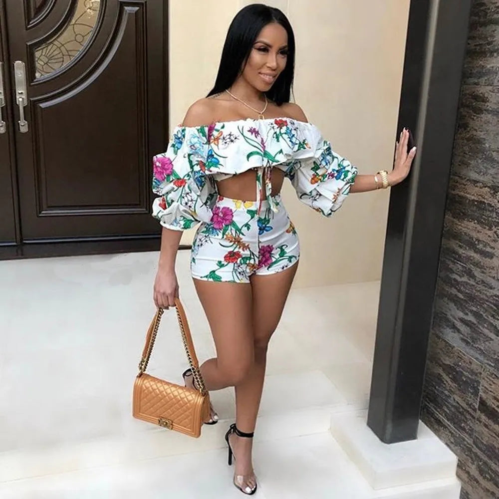 Multicolour digital print women's two-piece tracksuit with pile sleeves on the short top and matching shorts.