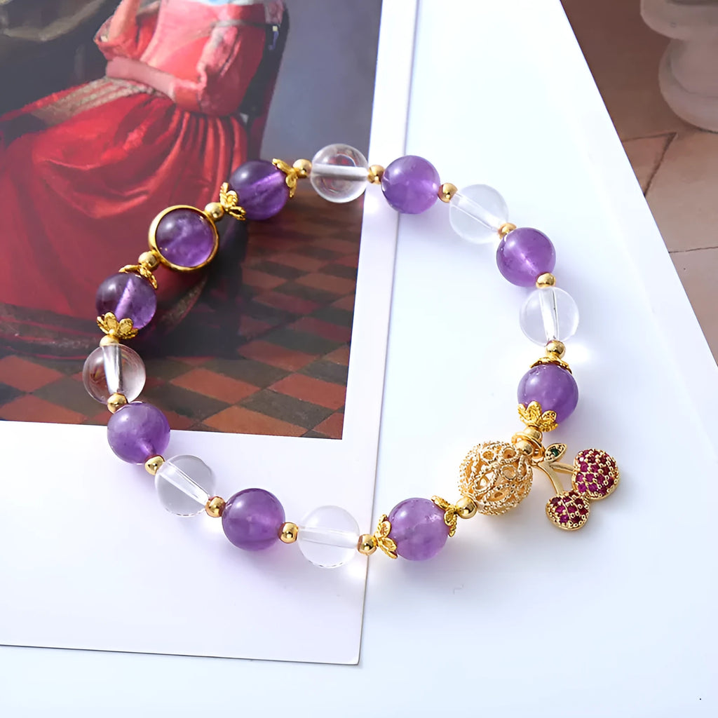 Purple crystal women's bracelet with micro-inlaid cherry blossom design in amethyst colour tones.
