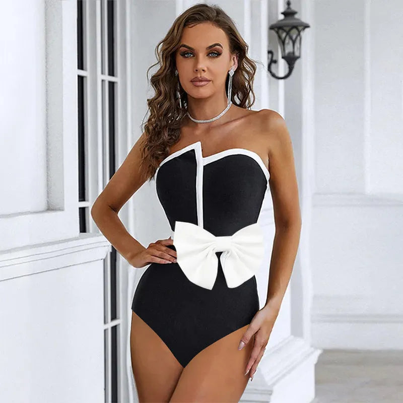 Black and white colour-blocking women's swimsuit with bow detail and irregular tube top