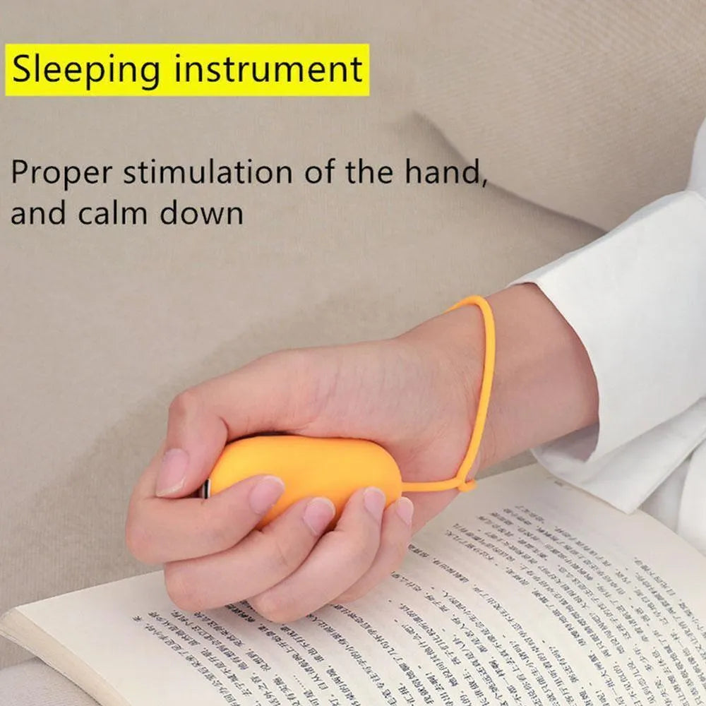 Hand-held micro-current sleep aid device with round button and USB charging port