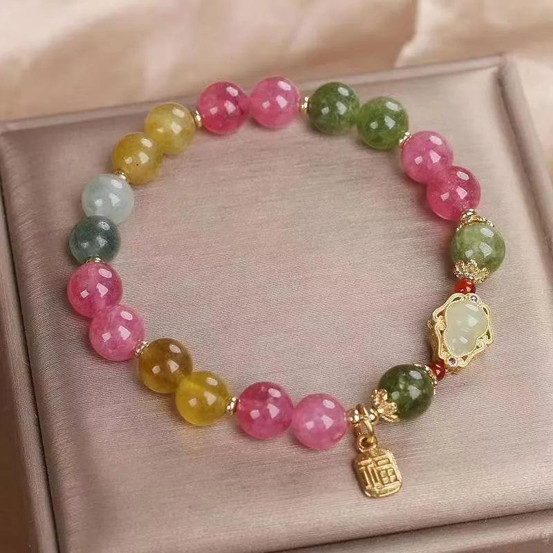 Women's colourful tourmaline bracelet with gourd charm and flower design on mixed materials