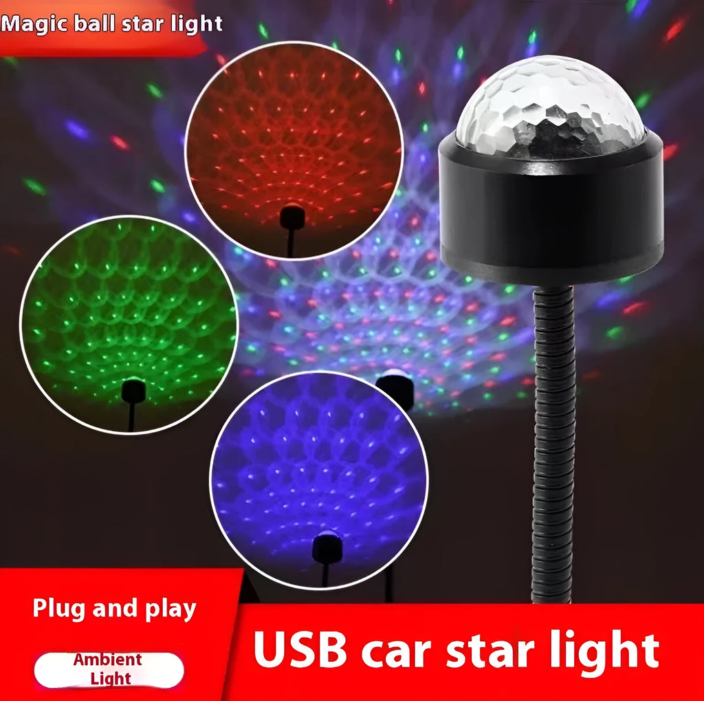 USB car atmosphere projection star light in black ABS plastic plugged into a vehicle interior