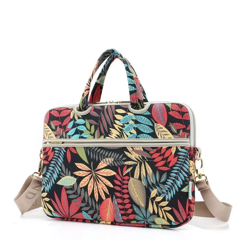 Canvas laptop sleeve with printed pattern for 13-15 inch notebooks, plush lining, and padded shoulder strap
