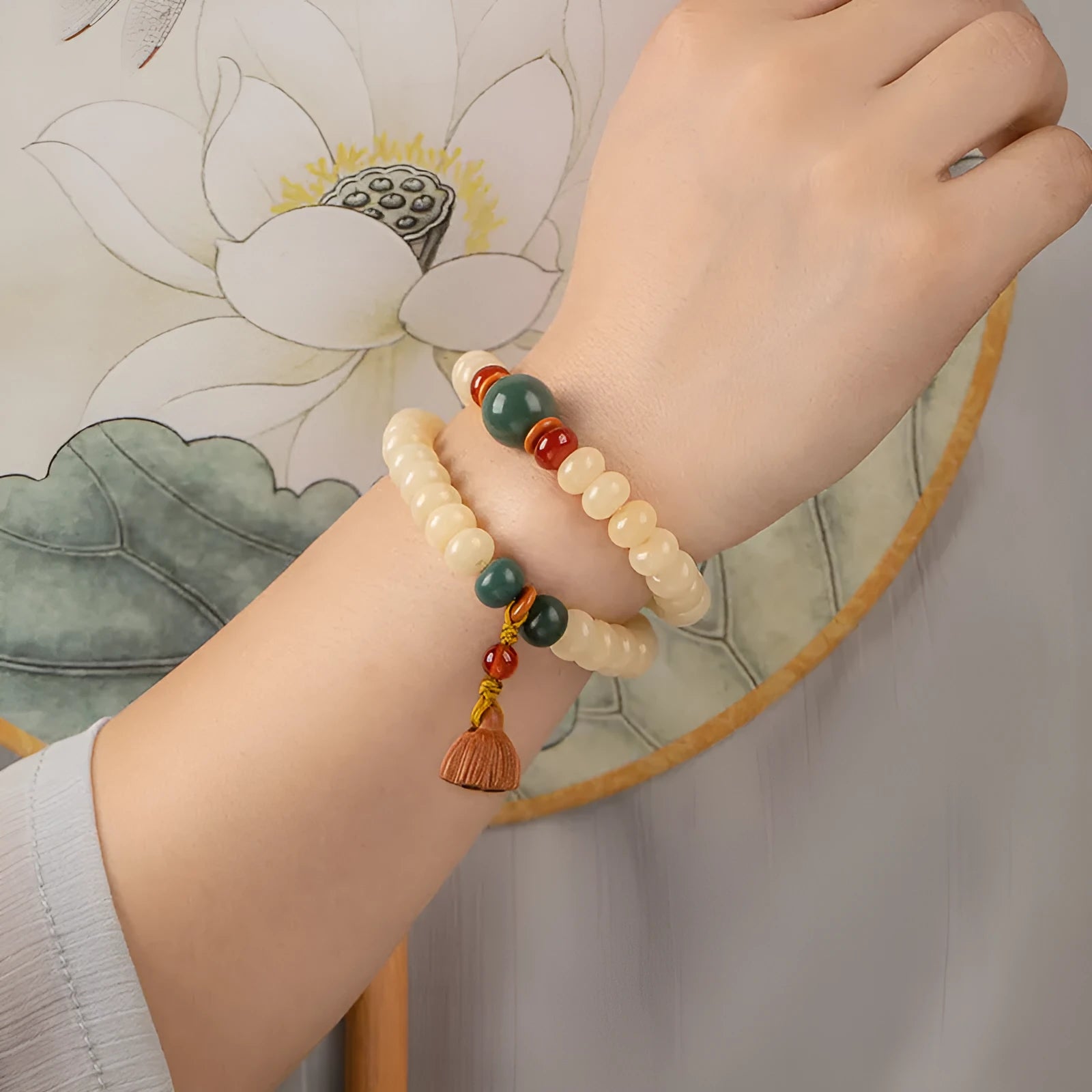 Women's wooden Bodhi root bracelet with 6x9mm flat round beads in cream colour