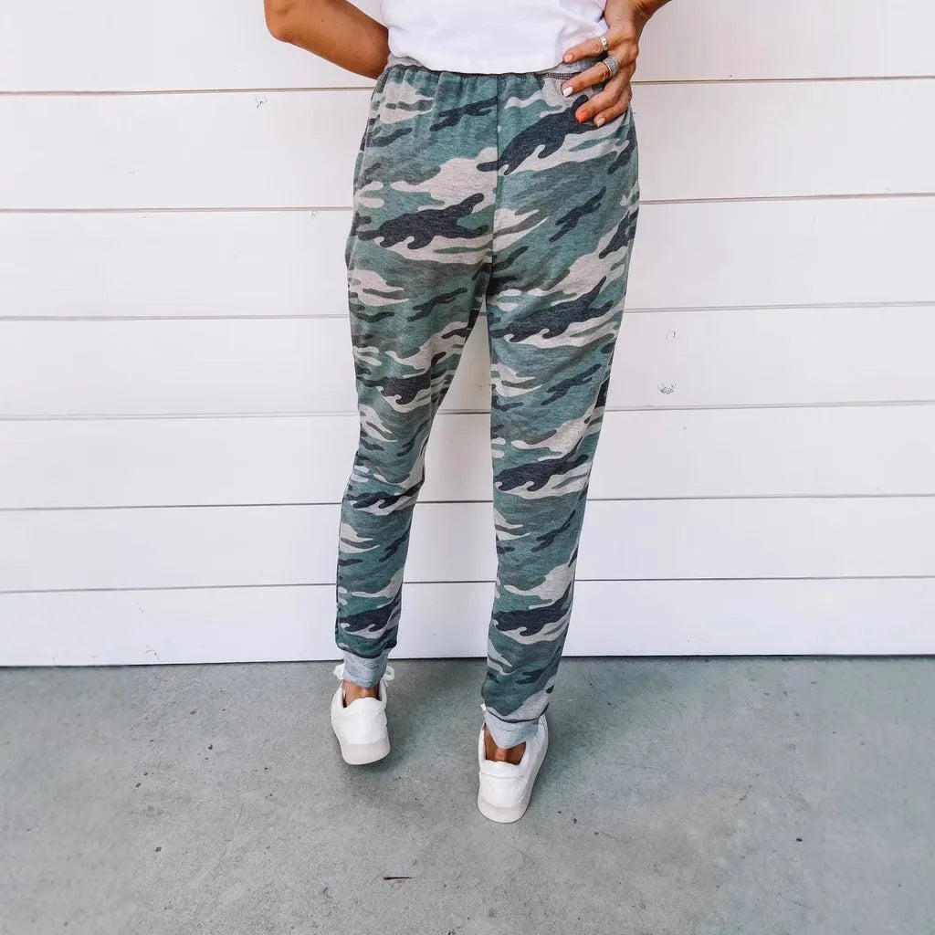 Women's polyester pencil leggings with leopard print irregular colour-block pattern, mid-rise elastic waist