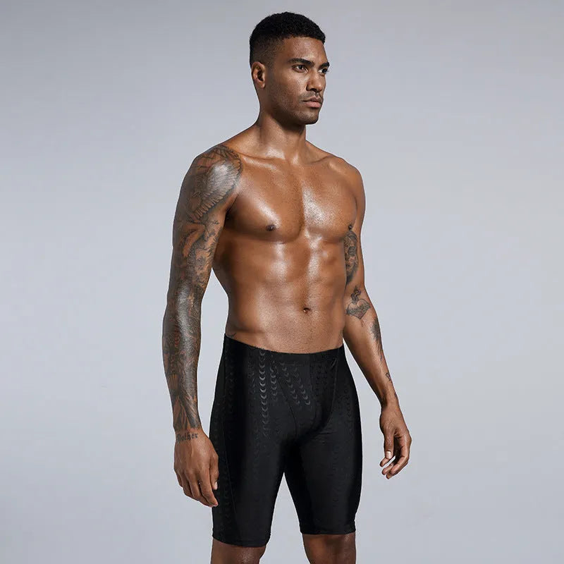 Men's solid colour polyester swimming trunks for swimming and beach activities