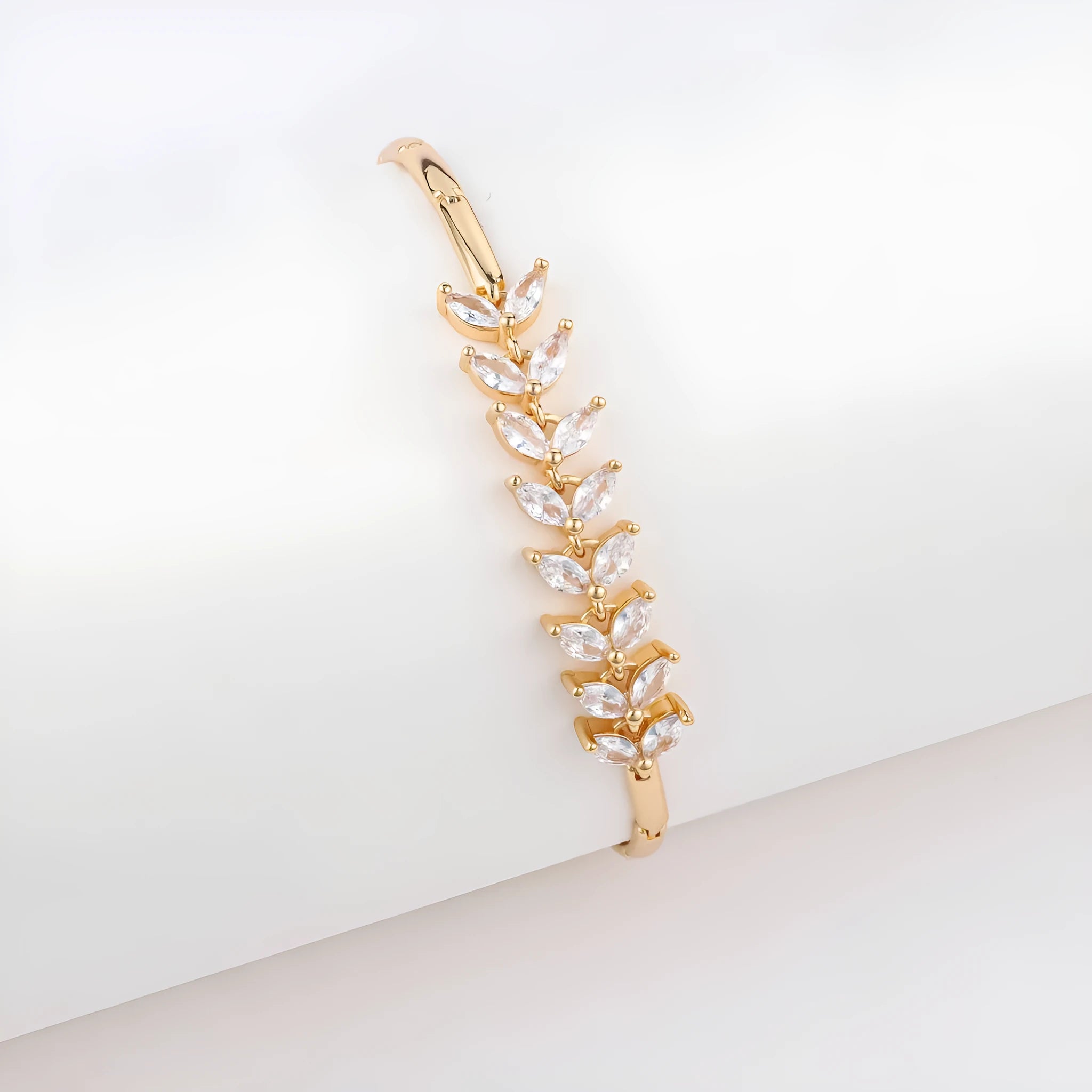 18K gold-plated butterfly clover bracelet with zircon stones on women's wrist