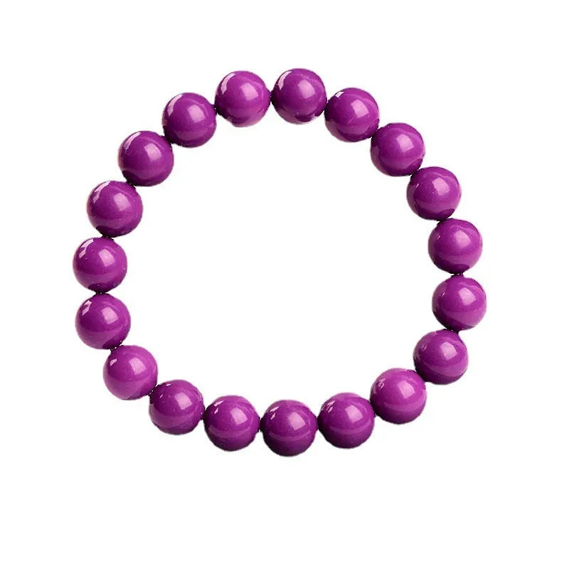 Jiuya brand purple mica crystal bracelet with polished beads on a wrist.
