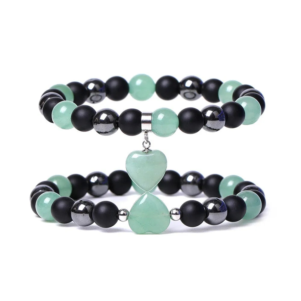 Hand-cut geometric peach heart stone bracelet with moon symbols in tigereye colour