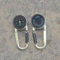 Black zinc alloy double-sided carabiner with a climbing button closure, showing integrated compass and thermometer.