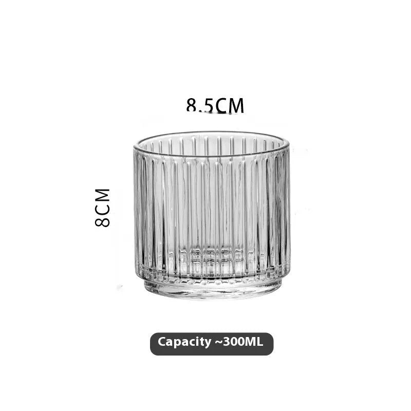 Modern simplicity clear glass whiskey cup with diamond pattern on a table, single piece