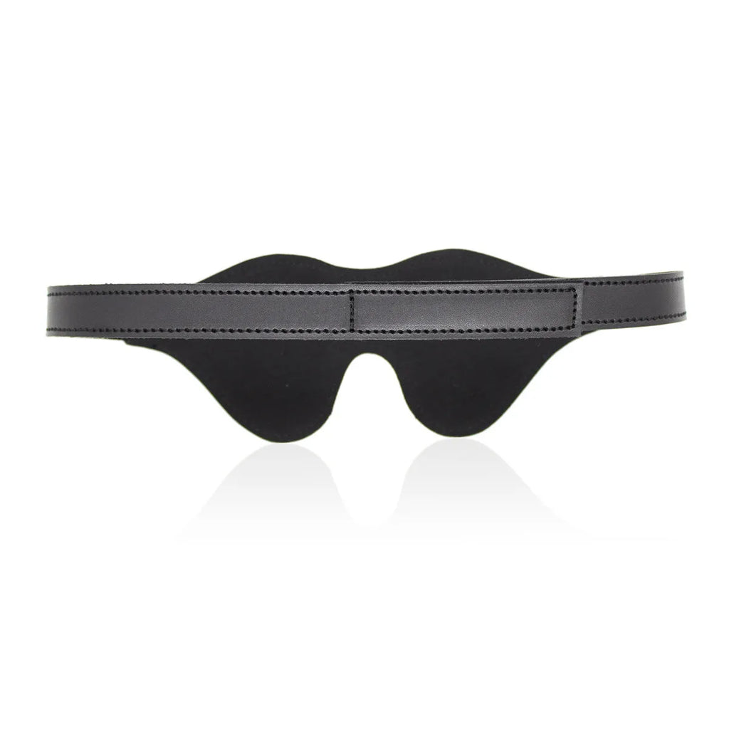 Women's black leather eye mask with 3D shape, Velcro strap, and metal rivet details.