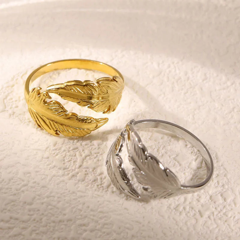 Adjustable stainless steel feather ring showing electroplated finish in silver or gold colour option