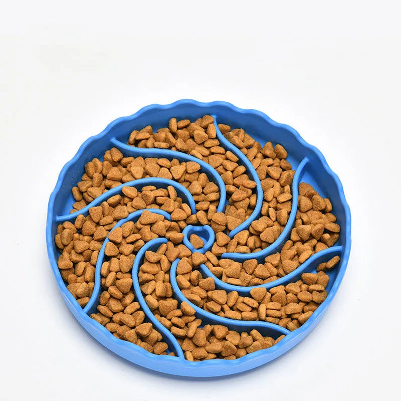 Food-grade silicone slow feeder dog bowl in blue with suction cup base and raised maze ridges