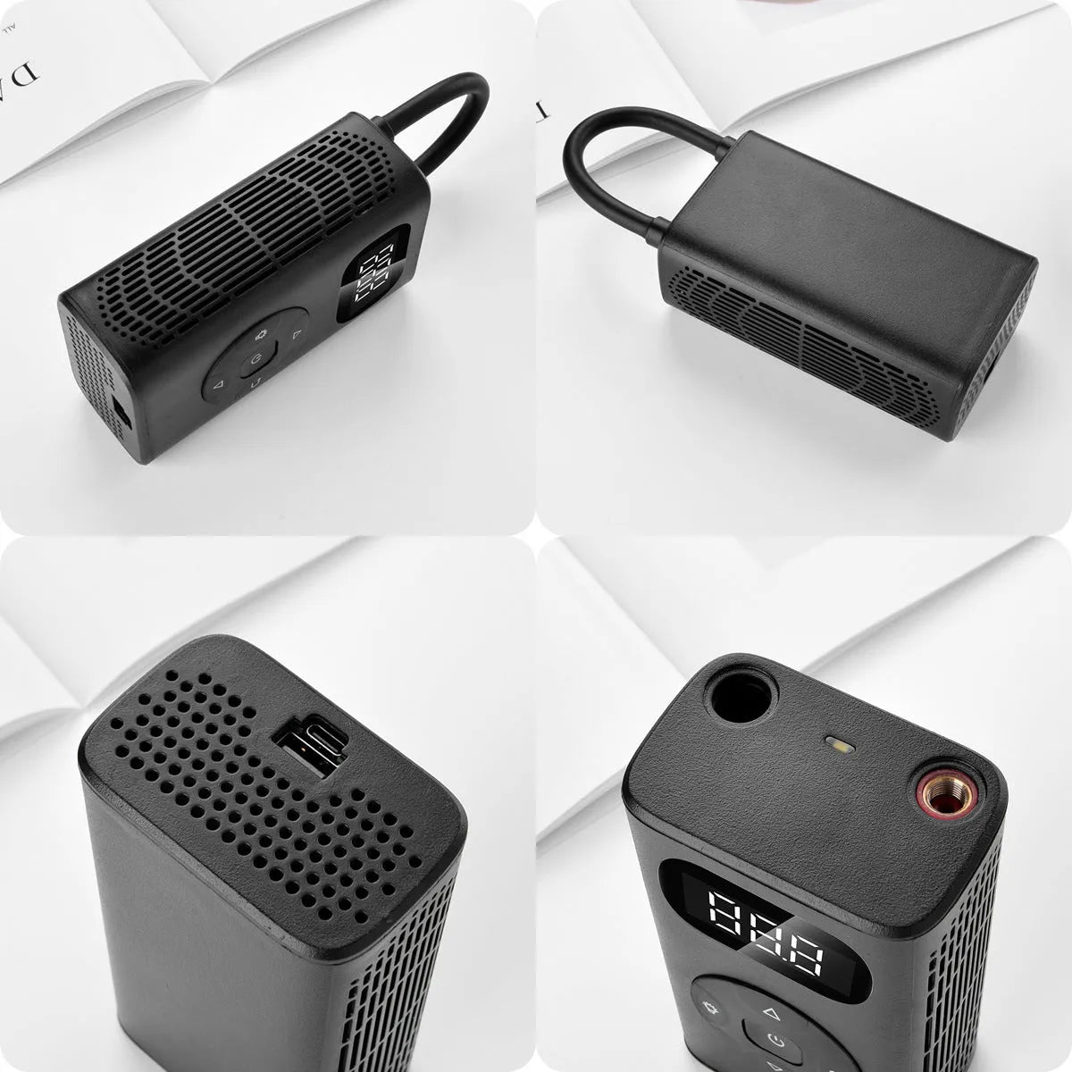 Black rectangular portable tyre inflator and power bank unit with a connected inflation hose on a table.