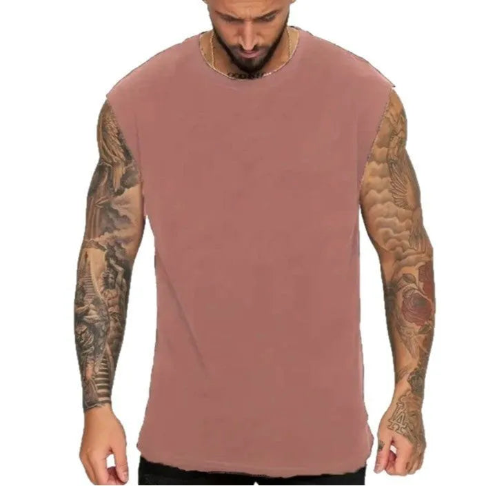 Men's loose sleeveless cotton tank top in a solid colour on a hanger