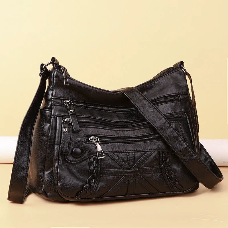 Soft PU casual messenger bag with multi-layer multi-pocket design in black colour