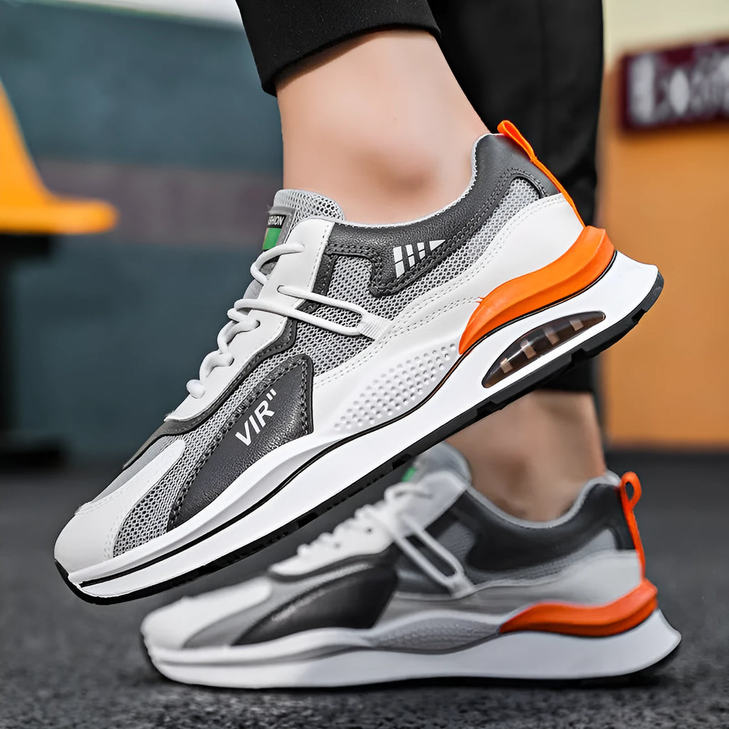 Men's grey and black mesh running shoes with EVA sole and sewing thread detail on a white background.