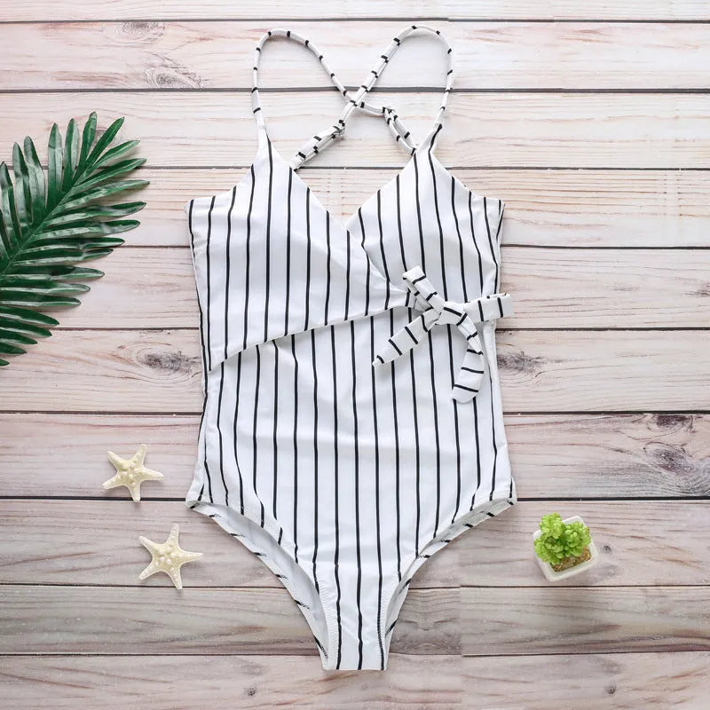 Women's vertical one-piece swimsuit in polyester with v-neck design in black colour