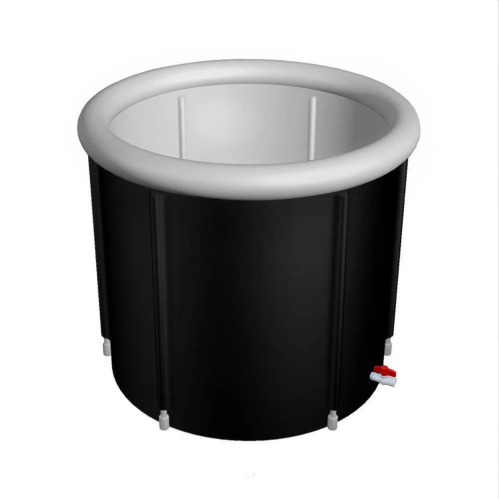 Black inflatable portable ice bath tub with elasticated cover, shown with air pump and drainage accessories