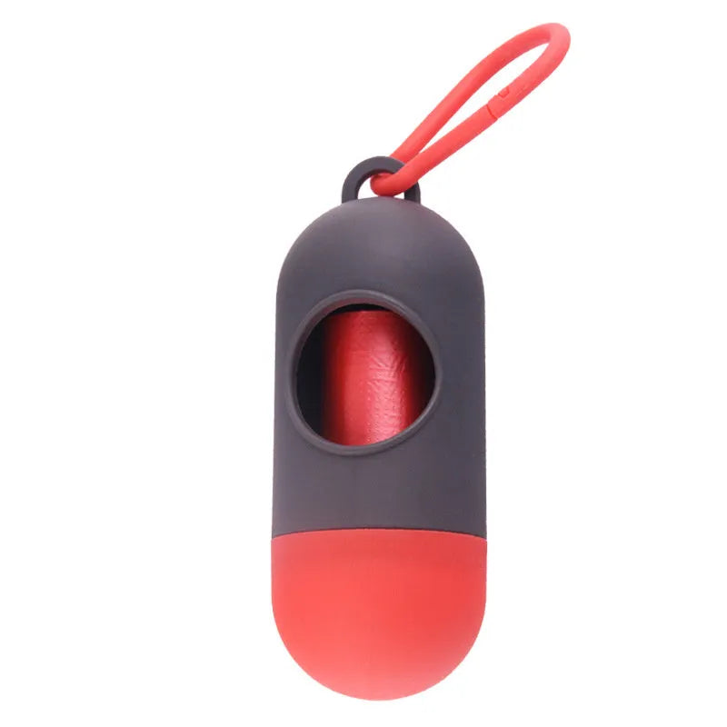 Black dog poop bag holder with side hook and Velcro closure, showing compact size.