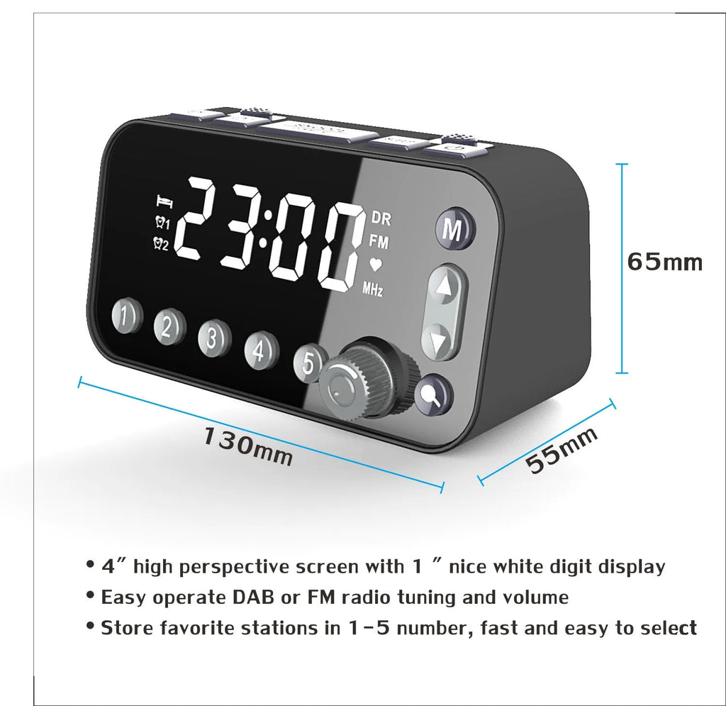 Black DAB bedside alarm clock with large LED display, pig tail antenna, and USB ports on a wooden table.