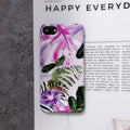 White leaf and morning glory flower oil painting design on an iPhone protective case.