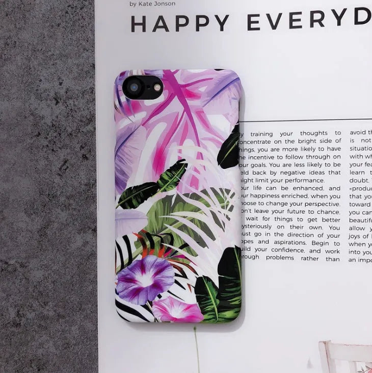 White leaf and morning glory flower oil painting design on an iPhone protective case.