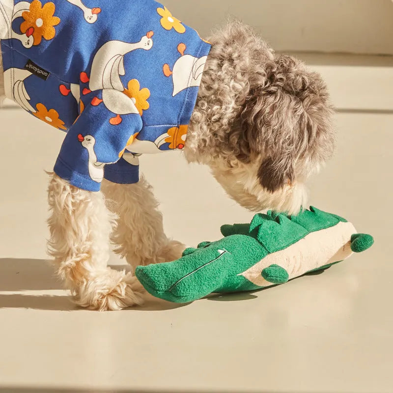 Green soft plush toy dog measuring 35 cm long on a white background