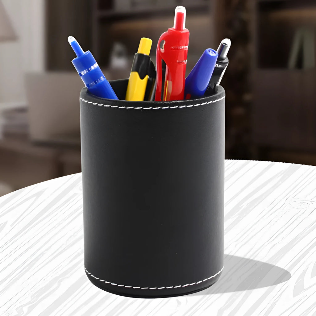 Small black leather round pen holder with 8cm diameter and 10.8cm height dimensions