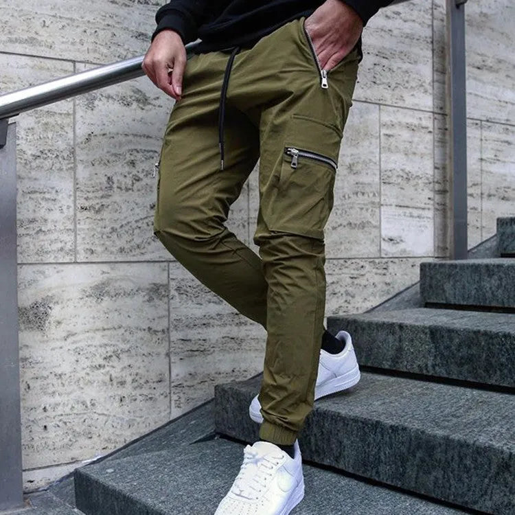 Men's zipper multi-pocket loose casual trousers in black with adjustable belt and small leg opening