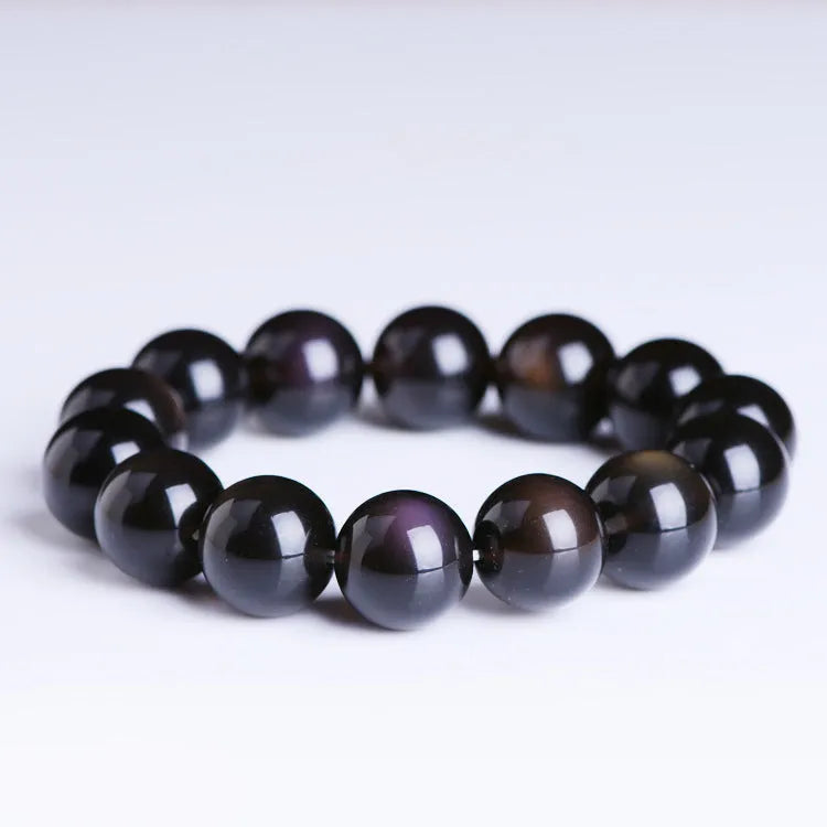 Unisex polished crystal Pi Xiu bracelet in ethnic geometric design with ice stone beads.