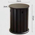 Modern round iron dining stool with stackable design in a wood-tone finish.