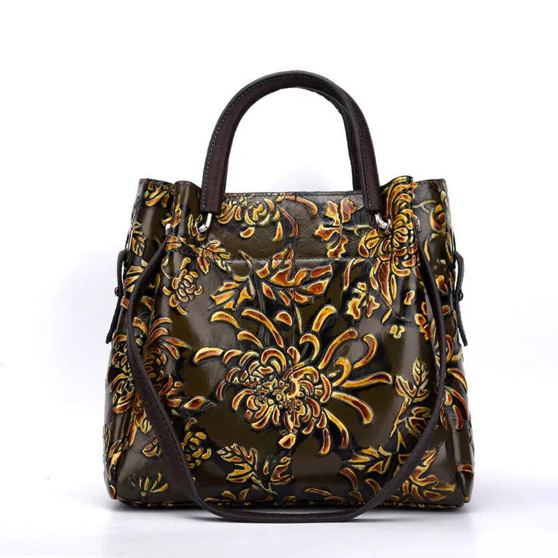 Trendy women's three-dimensional embossed first layer cowhide messenger bag with floral pattern in brown