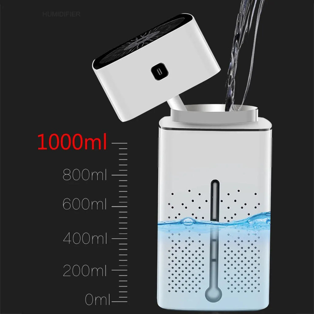 Black and white USB desktop humidifier with 1000ml water tank on a desk.