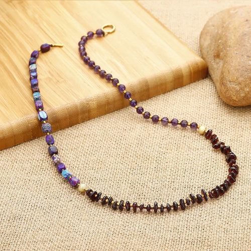 Handcrafted purple amethyst and garnet stone bracelet with geometric bead arrangement